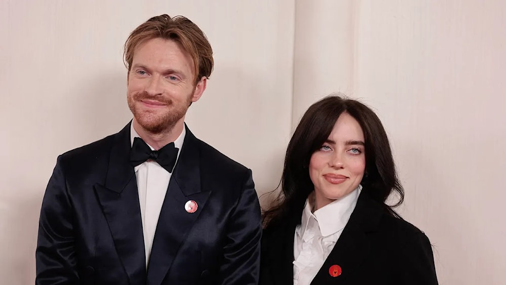 Finneas O'Connell and Billie Eilish at the Oscars 2024 (AFP via Getty Images)