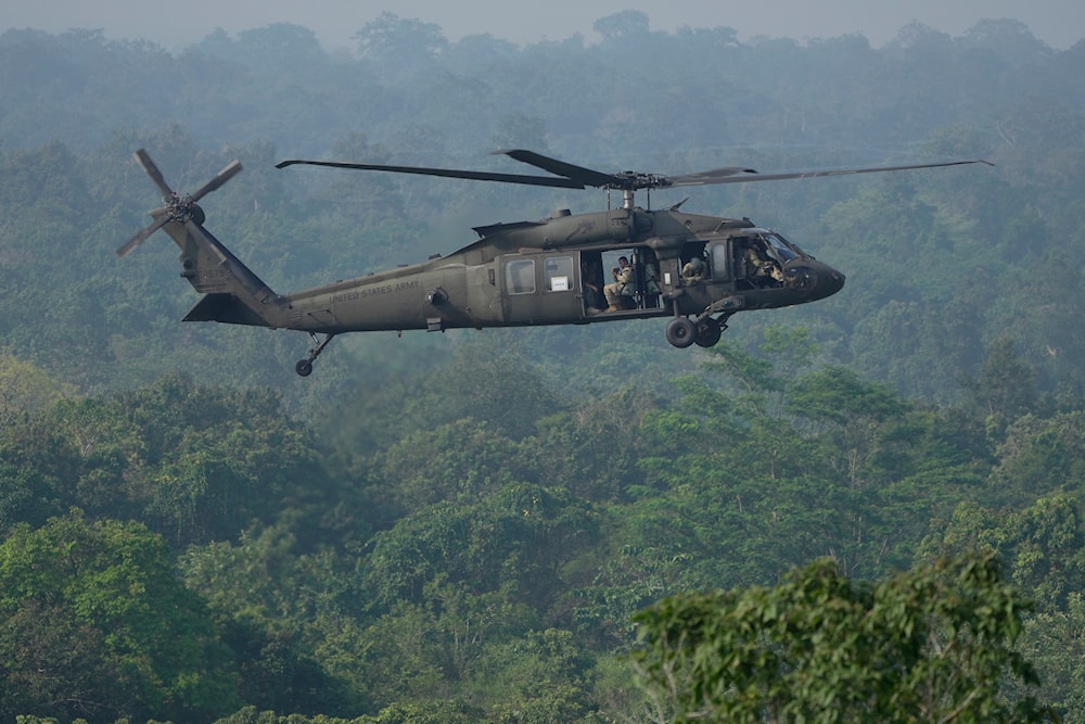 A U.S. Army Blackhawk helicopter flies past during Super Garuda Shield 2022 joint military exercises in Baturaja, Indonesia, Friday, Aug. 12, 2022. (AP)