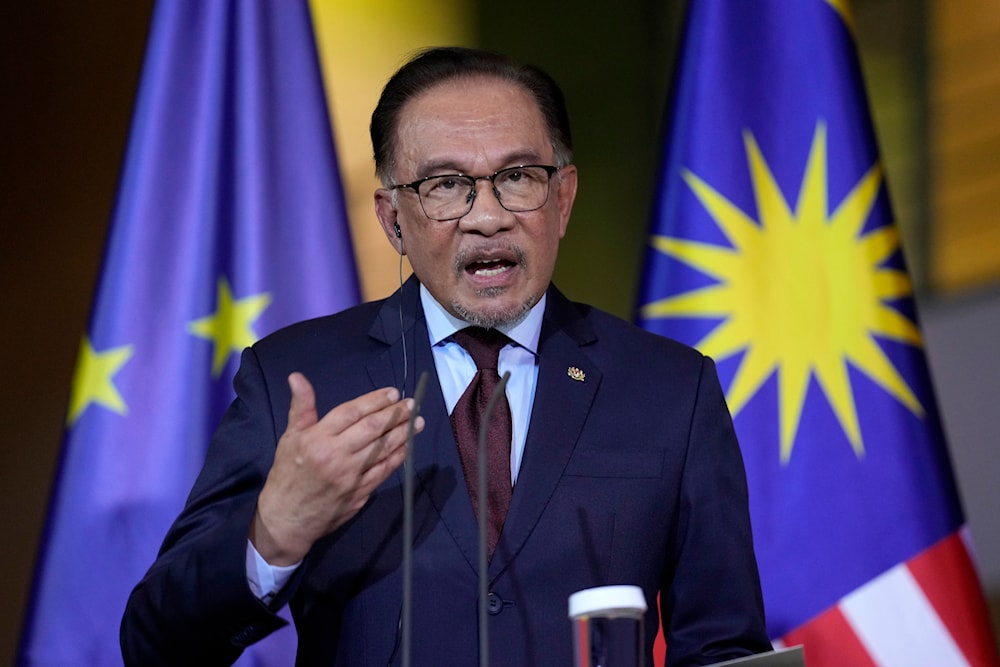 Malaysian Prime Minister Anwar Ibrahim speaks during a joint press conference in Berlin, Monday, March 11, 2024. (AP)