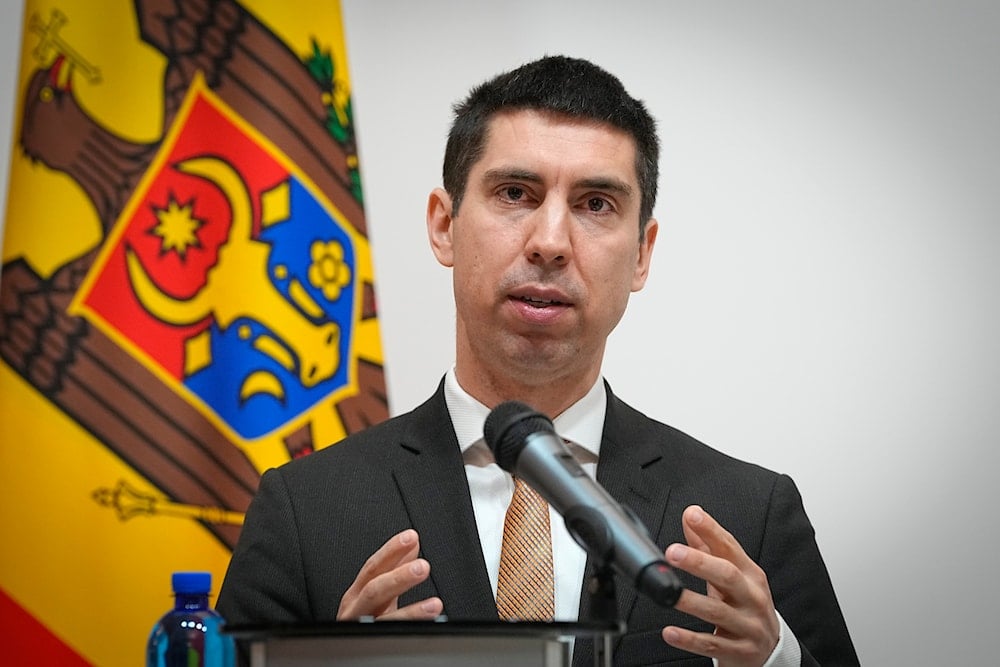 Moldova's Foreign Minister Mihai Popsoi, attends a joint news conference with Ukraine's Foreign Minister Dmytro Kuleba in Kiev, Ukraine, Wednesday, March. 13, 2024. (AP)