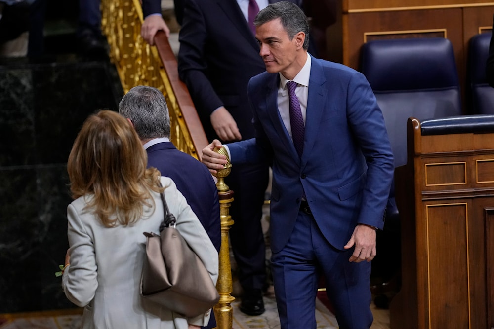 Spain's Socialist Prime Minister Pedro leaves the Spanish Parliament in Madrid, Spain, Thursday, March 14, 2024 (AP)