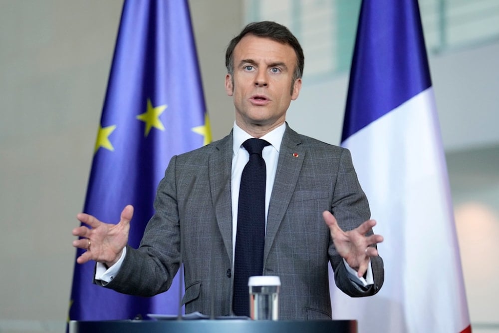 French President Emmanuel Macron talks to the media in Berlin, Germany, Friday, March 15, 2024. (AP)