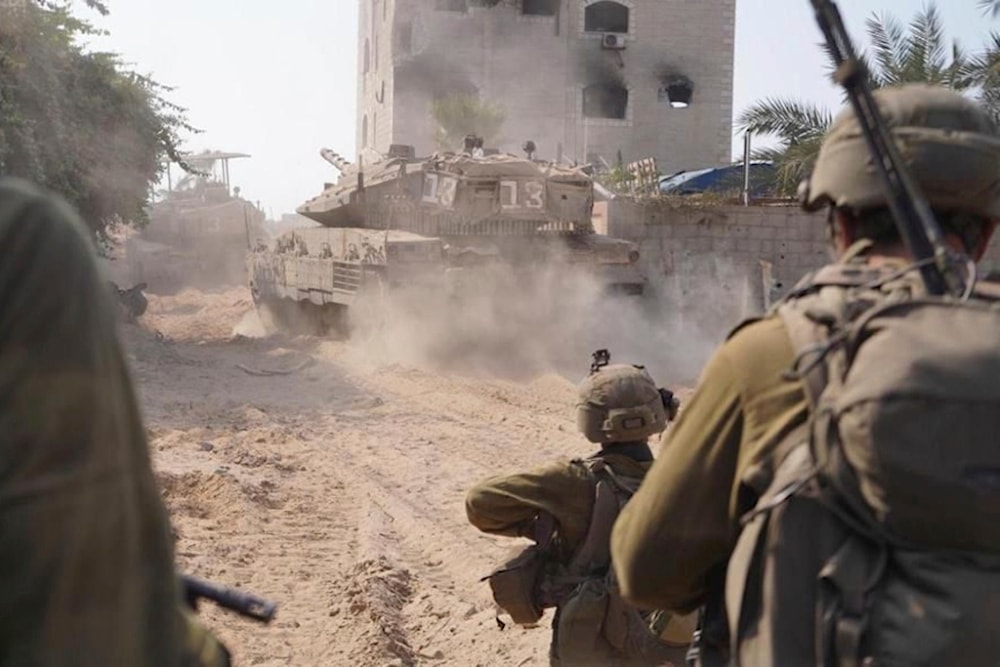 In this photo released by the Israeli occupation forces on Sunday, Nov. 5, 2023, shows ground occupation troops inside the Gaza Strip. (AP)
