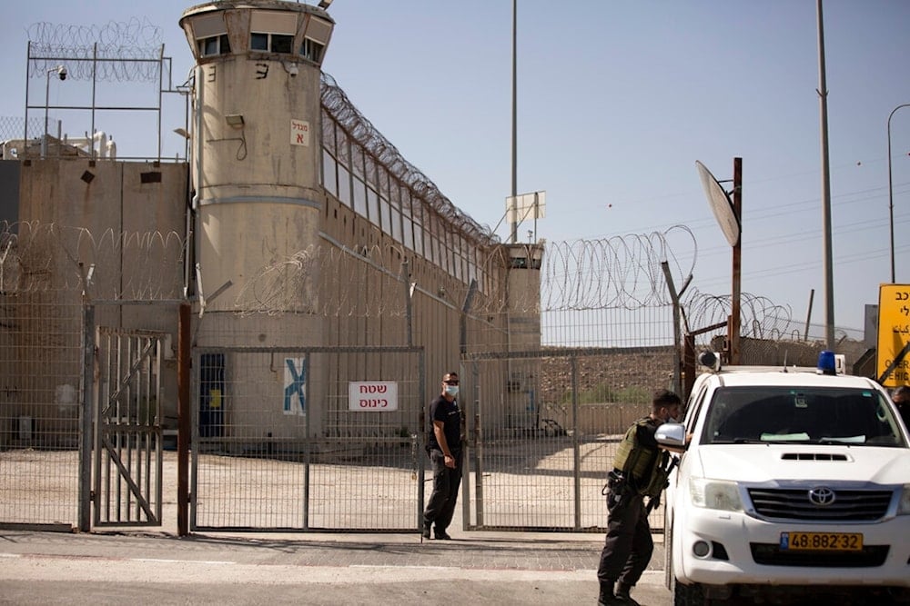 Israeli occupation prison guards outside of Ofer Prison near al-Quds, Thursday, Sept. 9, 2021. (AP)