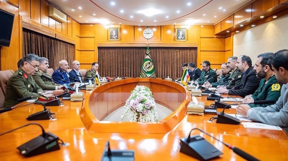 Iran's Defense Minister Brigadier General Mohammad Reza Ashtiani (4th R) and his Syrian counterpart Ali Mahmoud Abbas (3rd L) meet in Tehran on March 16, 2024. (Photo by Tasnim news agency)