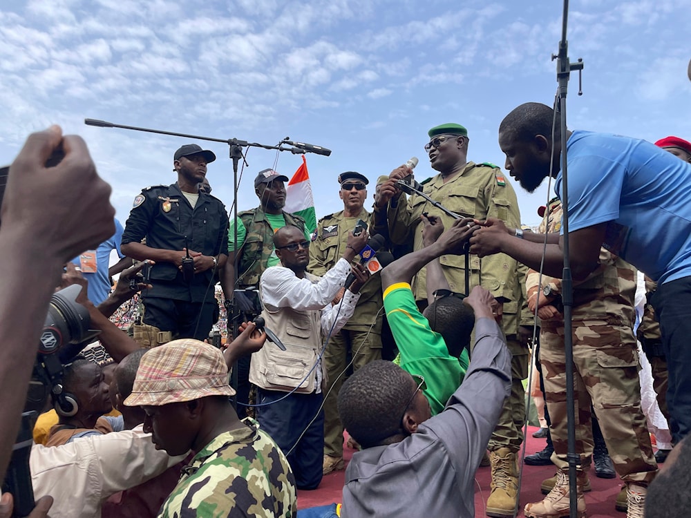 Mohamed Toumba, one of the soldiers who ousted Nigerian President Mohamed Bazoum, addresses supporters of Niger's ruling junta in Niamey, Niger, August 6, 2023 (AP)