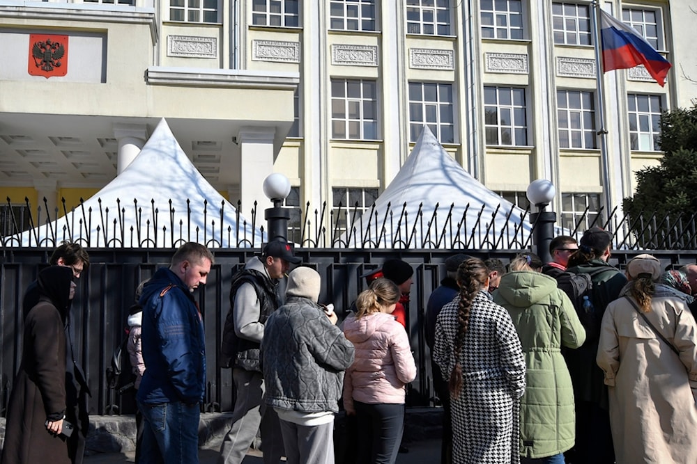 Voters queue outside the Russian Embassy in Bishkek, Kyrgyzstan, Sunday, March 17, 2024. (AP)