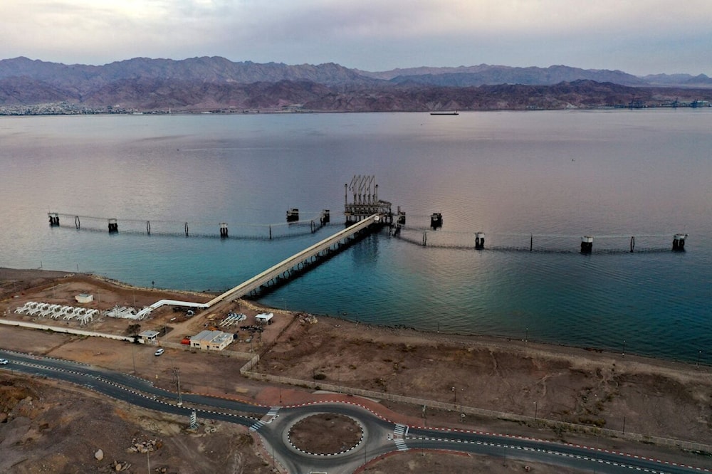 An aerial view of the 'Eilat-Ashkelon' oil terminal at Israel's southern Red Sea port city of 'Eilat', occupied Umm Rashrash, occupied Palestine, on February 9, 2021. (AFP)
