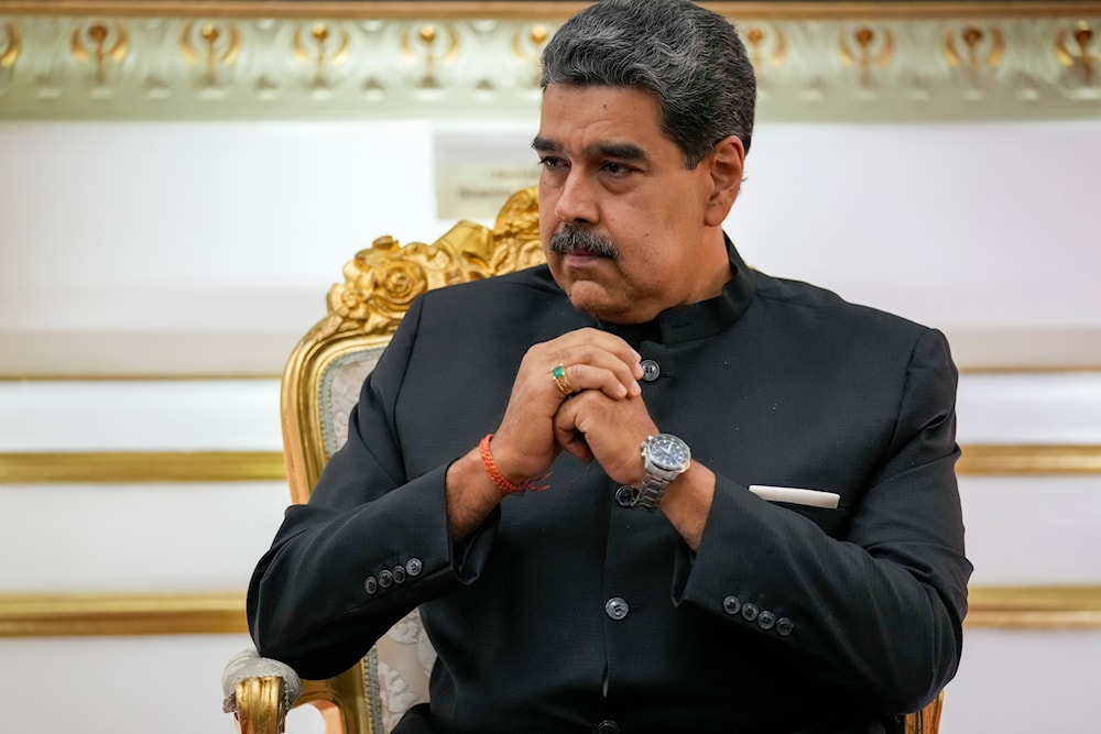 Venezuelan President Nicolás Maduro listens during their meeting at Miraflores presidential palace in Caracas, Venezuela, February 20, 2024. (AP)