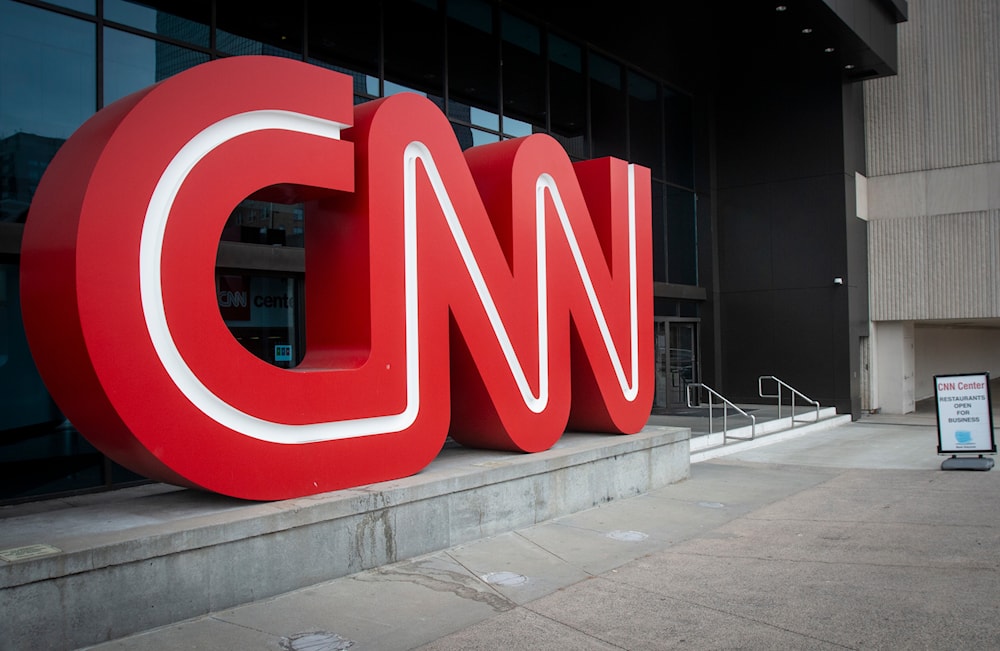 The CNN logo is displayed at the entrance to the CNN Center in Atlanta on Wednesday, Feb. 2, 2022 (AP)