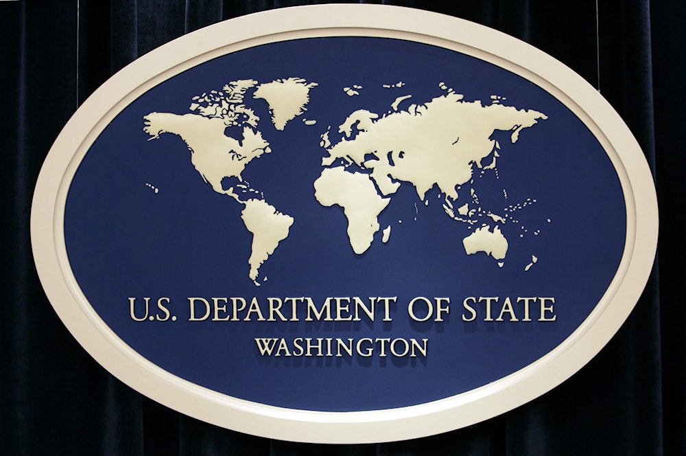the State Department sign used as a backdrop at the State Department in Washington on Aug. 10, 2006. (AP)