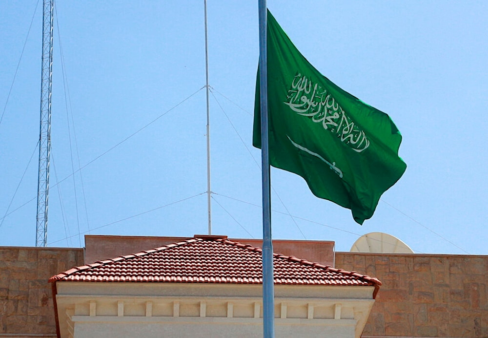 The Saudi Arabian flag waves over the newly opened consulate building in Baghdad, Iraq, Thursday, April 4, 2019. (AP)
