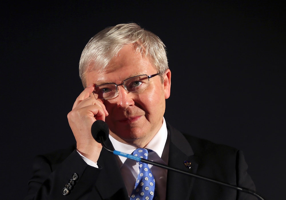 Australian Prime Minister Kevin Rudd adjusts his glasses during a speech at a pre-election rally in Mt. Druitt, Australia on September 6, 2013. (AP)