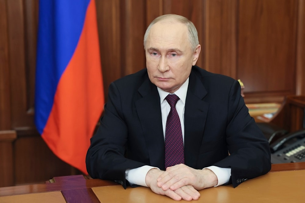 Russian President Vladimir Putin addresses voters in the 2024 presidential election at the Kremlin, in Moscow, Russia, Thursday, March 21, 2024 (AP)