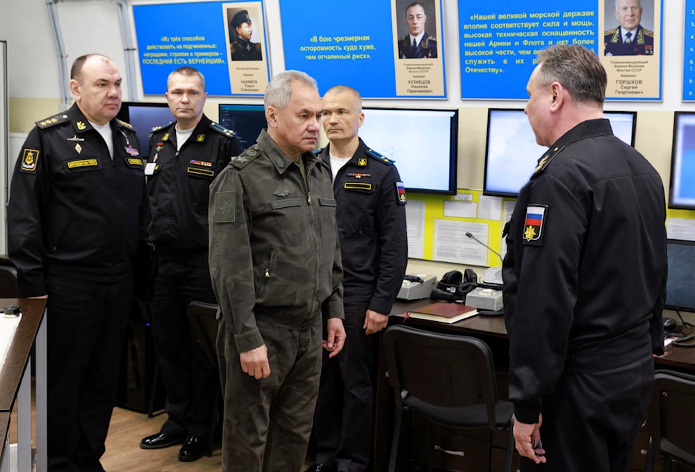 In this photo released by Russian Defense Ministry Press Service on Sunday, March 17, 2024, Russian Defense Minister Sergei Shoigu, center, visits the Black Sea Fleet's headquarters. (AP)