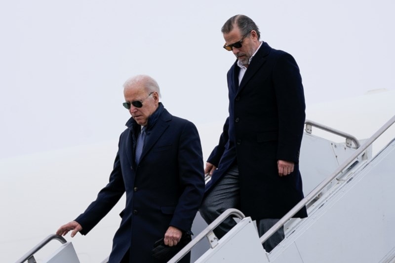 US president Joe Biden and his son Hunter Biden step off Air Force One at Hancock Field Air National Guard Base in Syracuse, New York, February 4, 2023. (AP)