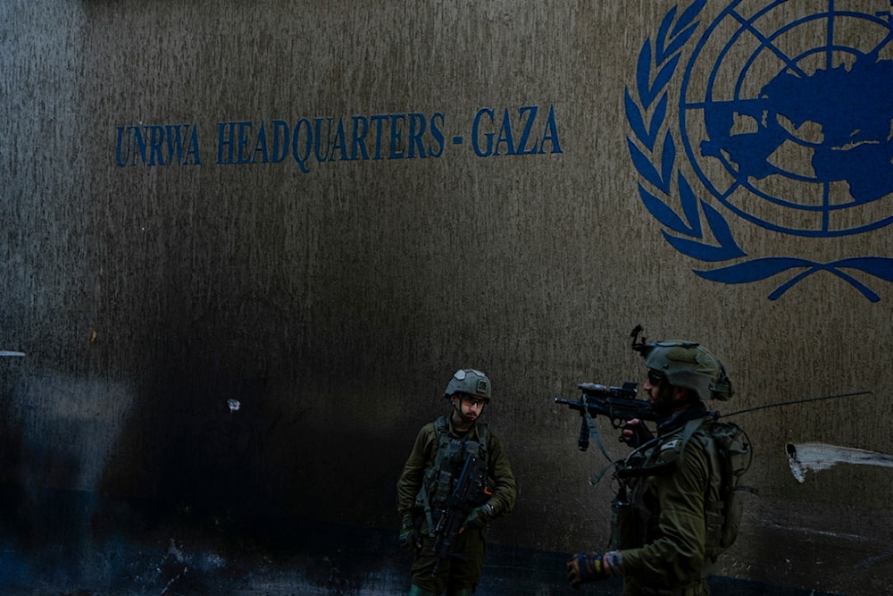 Israeli occupation forces take up position as they enter the UNRWA headquarters in the Gaza Strip, Palestine, Thursday, Feb. 8, 2024. (AP)
