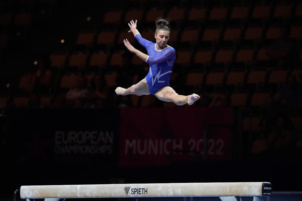 Petra Furac of Croatia competes in the women's balance beam during the European Gymnastics Championships in Munich, Germany, Thursday, Aug. 11, 2022. (AP)
