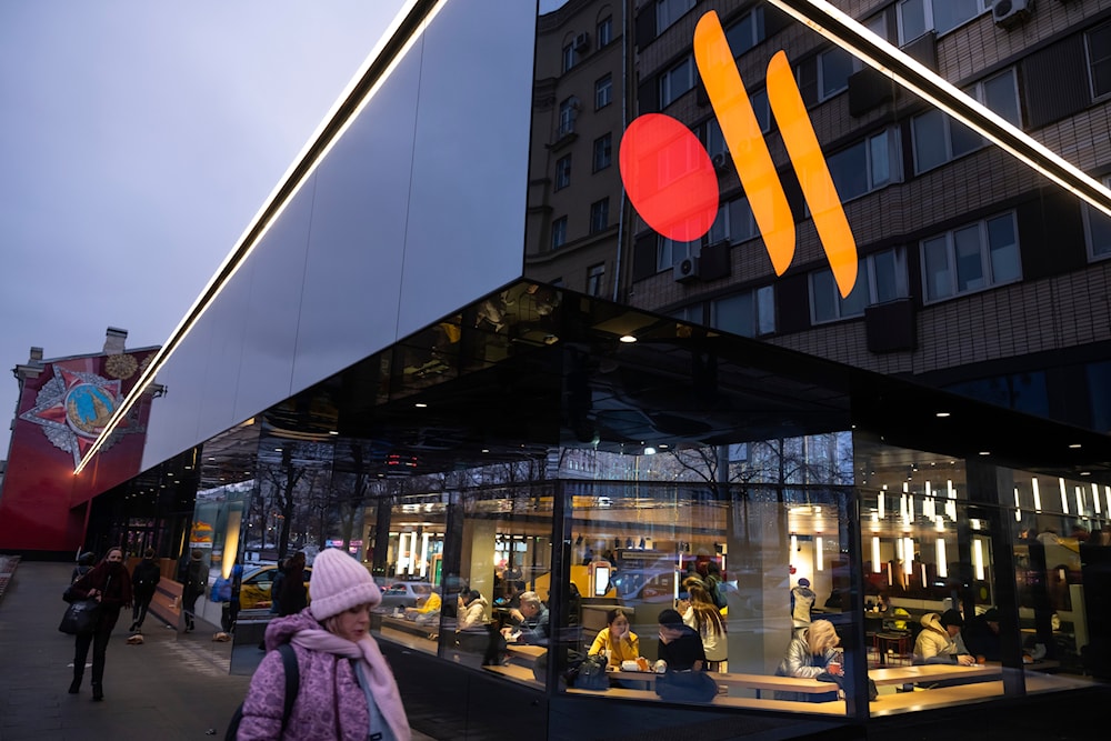 People line up to visit a newly opened restaurant in a former McDonald's outlet in Bolshaya Bronnaya Street in Moscow, Russia, Wednesday, Jan. 25, 2023.(AP)