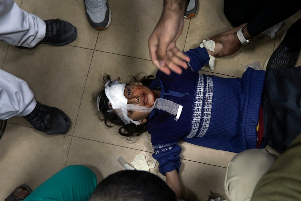 Palestinian child wounded in the Israeli bombardment of the Gaza Strip is brought to Al Aqsa hospital in Deir al Balah, Gaza Strip, Monday, March 25, 2024. (AP)