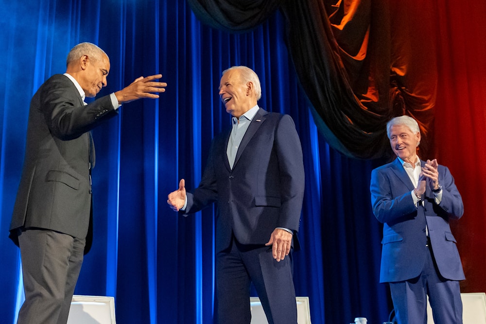 President Joe Biden, center, and former presidents Barack Obama and Bill Clinton participate in a fundraising event with Stephen Colbert at Radio City Music Hall,, March 28, 2024, in New York. (AP)