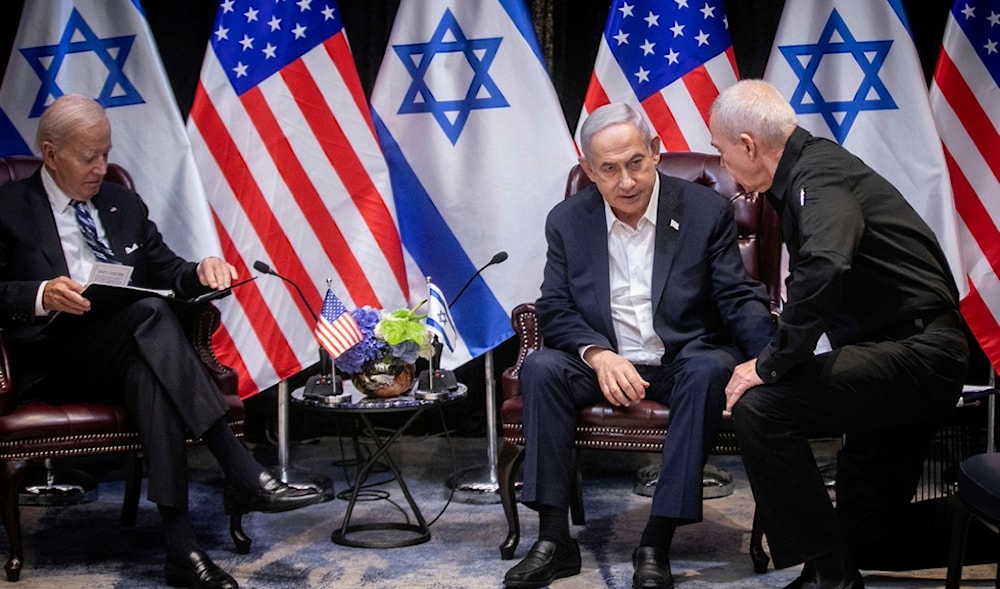 Israeli Prime Minister Benjamin Netanyahu confers with Security Minister Yoav Gallant during their meeting with U.S. President Joe Biden to discuss the war on Gaza, in 'Tel Aviv', occupied Palestine, Oct. 18, 2023 (AP)