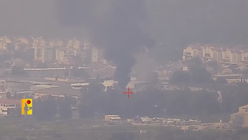 The resistance camera documents rising smoke as a result of direct hits caused by Islamic Resistance missiles inside the “Kiryat Shmona” settlement (Resistance Military Media)
