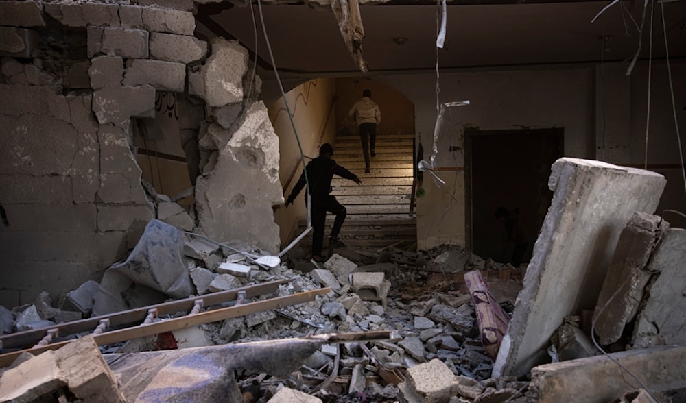 Palestinians check destruction after an Israeli strike in Rafah, Gaza Strip, Saturday, Feb. 24, 2024. (AP)