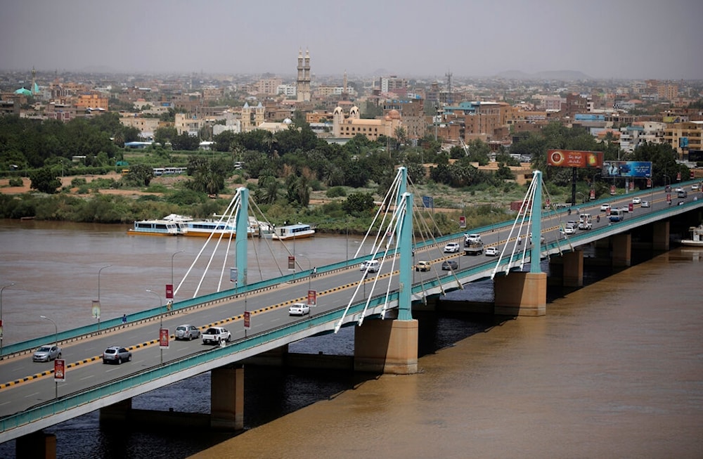 Traffic moves on a bridge in Sudan's capital Khartoum, Tuesday, Sept. 21, 2021. (AP)