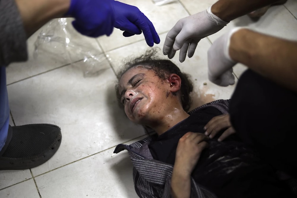 A Palestinian child wounded during the Israeli bombardment of the Gaza Strip receives treatment at the Nasser hospital in Nasser hospital in Khan Younis on Saturday on January 6, 2024. (AP)