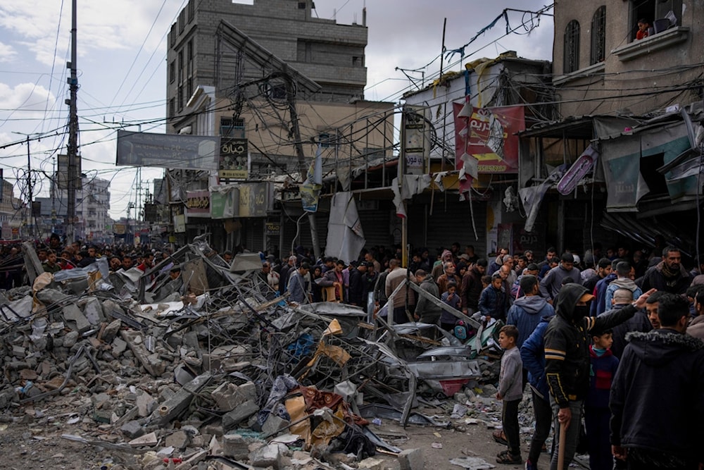 Palestinians check destruction after an Israeli strikea in Rafah, Gaza Strip, Monday, March 4, 2024. (AP)
