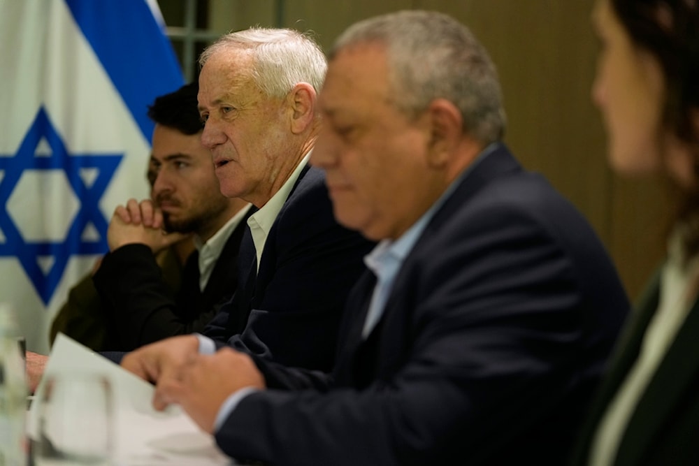 Former Israeli Defense Minister Benny Gantz, second left, meets with U.S. Secretary of State Antony Blinken in Tel Aviv, Israel, Thursday, Feb. 8, 2024. (AP Photo/Mark Schiefelbein, Pool)