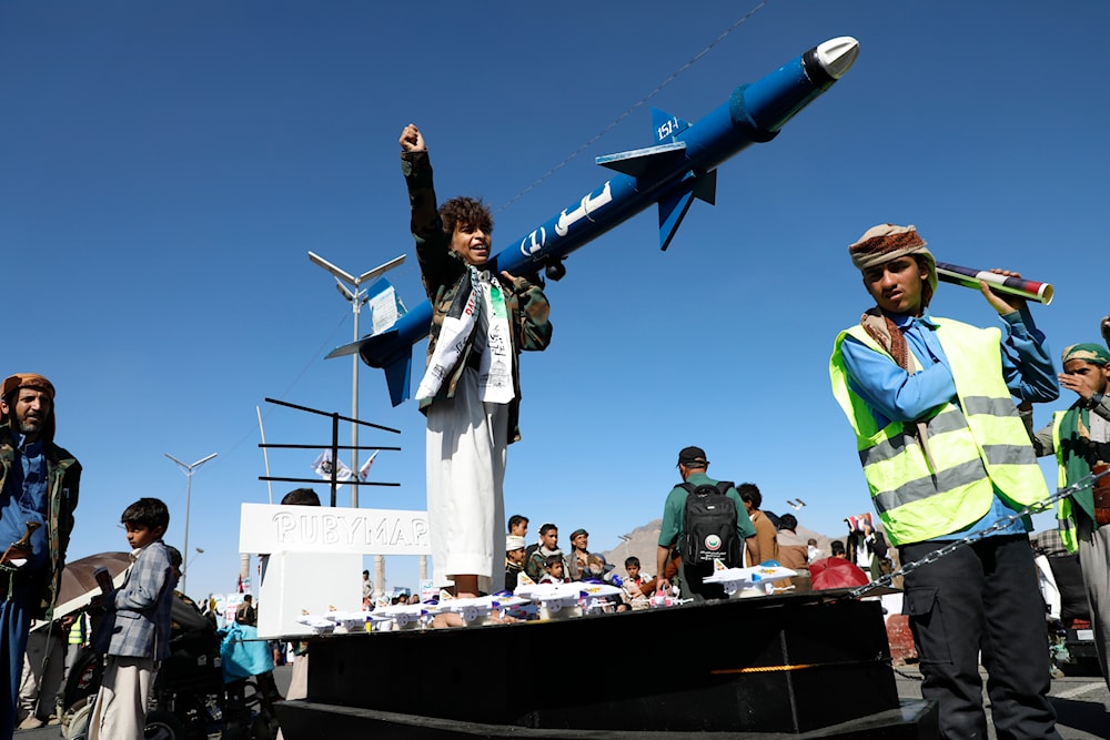 Yemenis attend a rally against the US-led strikes on Yemen and 'Israel's' war on Gaza, in Sanaa, Yemen, Friday, Feb. 23, 2024. (AP)