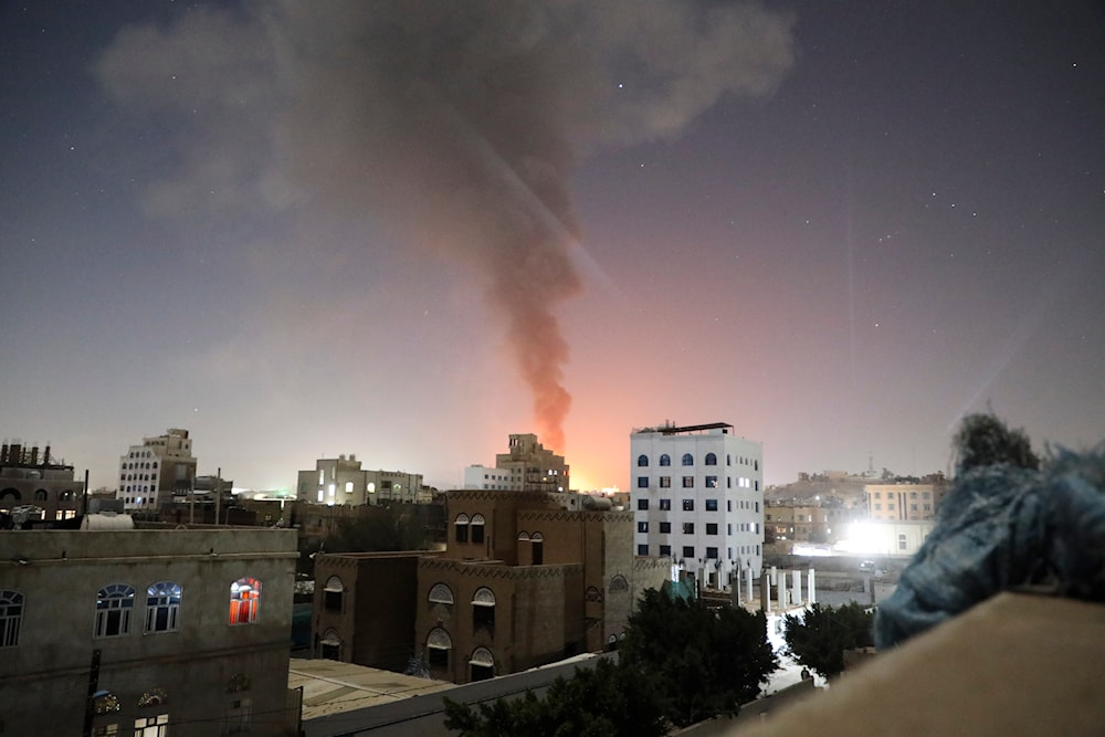 Smoke rises after the US-UK launched airstrikes against Sanaa, Yemen, on Sunday, Feb. 25, 2024. (AP)