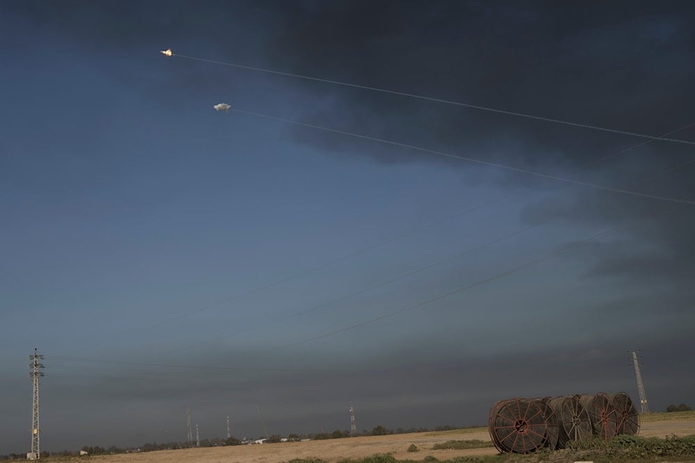 Israeli Iron Dome air defense system fires to intercept rockets fired from the Gaza Strip, in southern occupied Palestine, January 21, 2024 (AP)