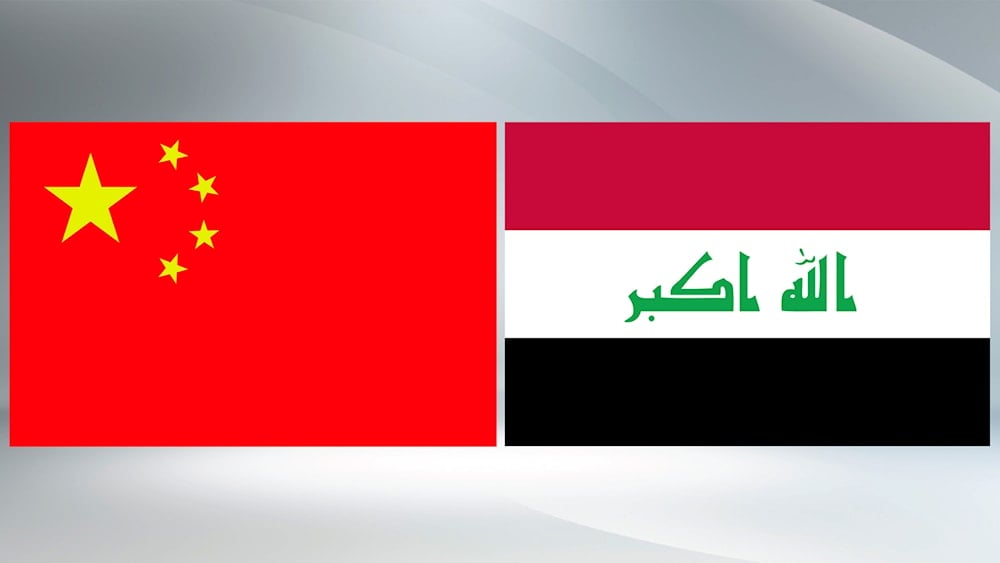 The flag of China and Iraq side by side (CGTN)