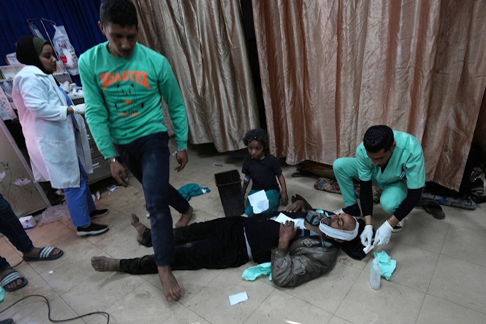 Palestinians wounded in the Israeli bombardment of the Gaza Strip are brought to Al Aqsa hospital in Deir al Balah, Gaza Strip, Friday, March 8, 2024. (AP Photo/Adel Hana)