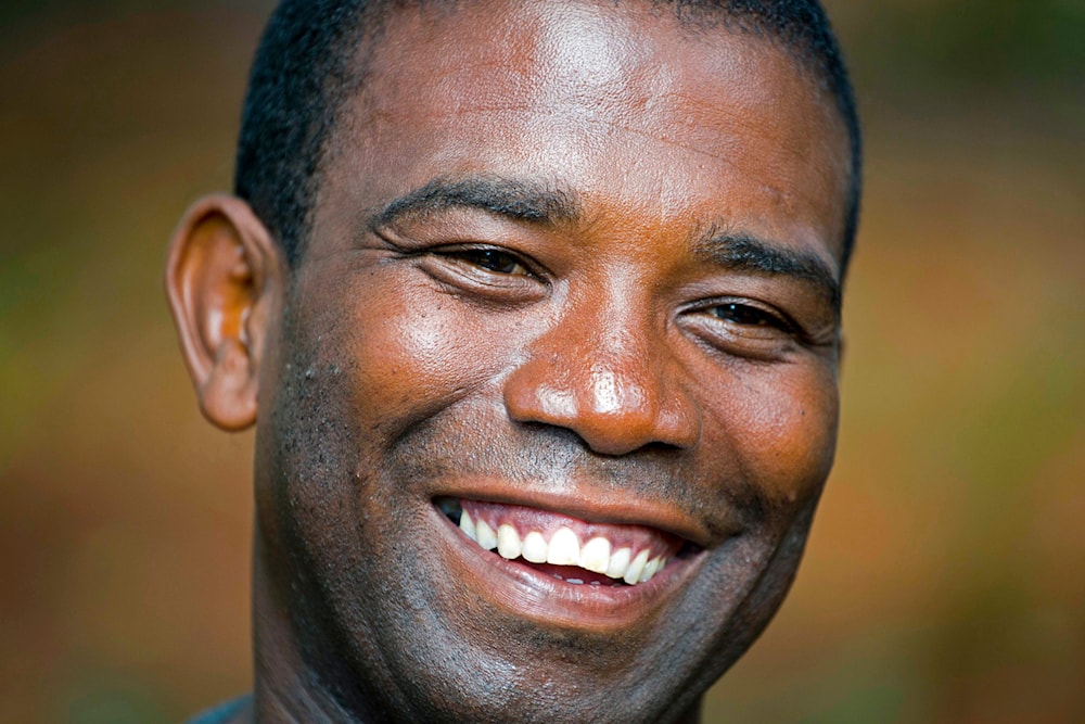 Guy Philippe smiles during an interview in Pestel, Haiti, Aug. 24, 2016.(AP)