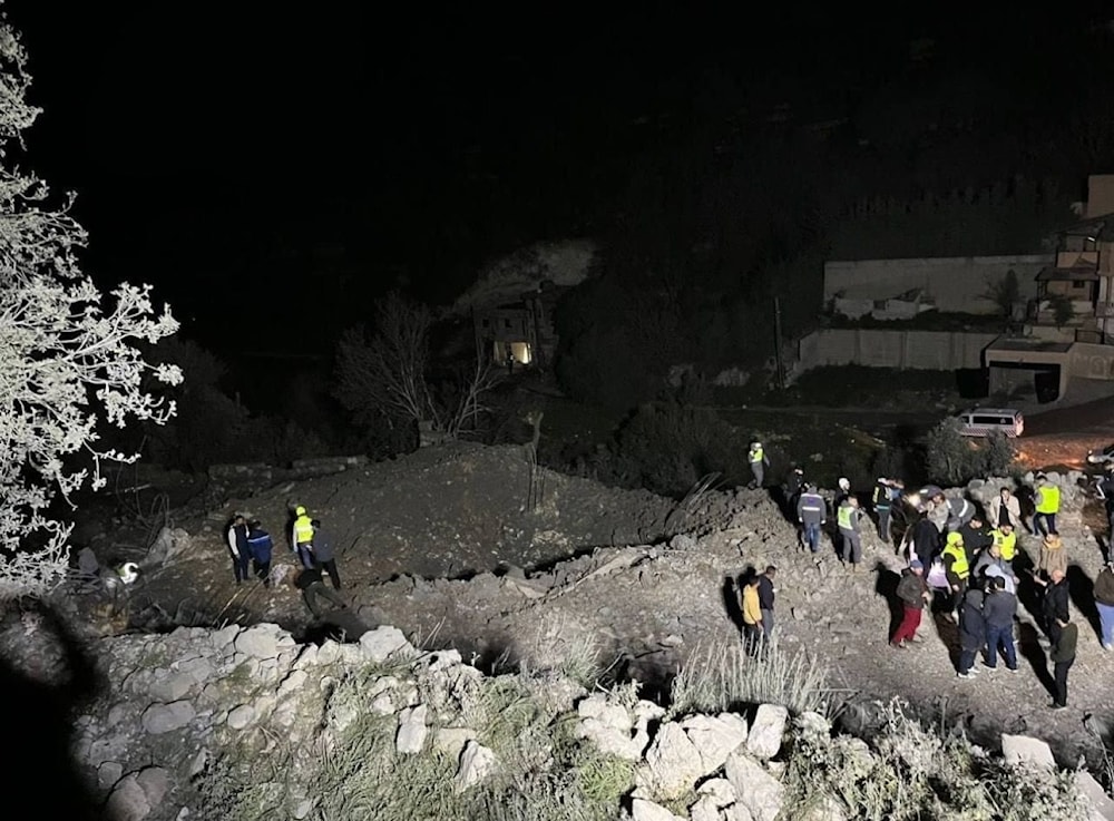 Rescue teams searching for missing people and martyrs beneath the rubble of a house attacked by 'Israel' in Khirbet Selem, South of Lebanon, on Sat. 9 March, 2024 (Social Media)