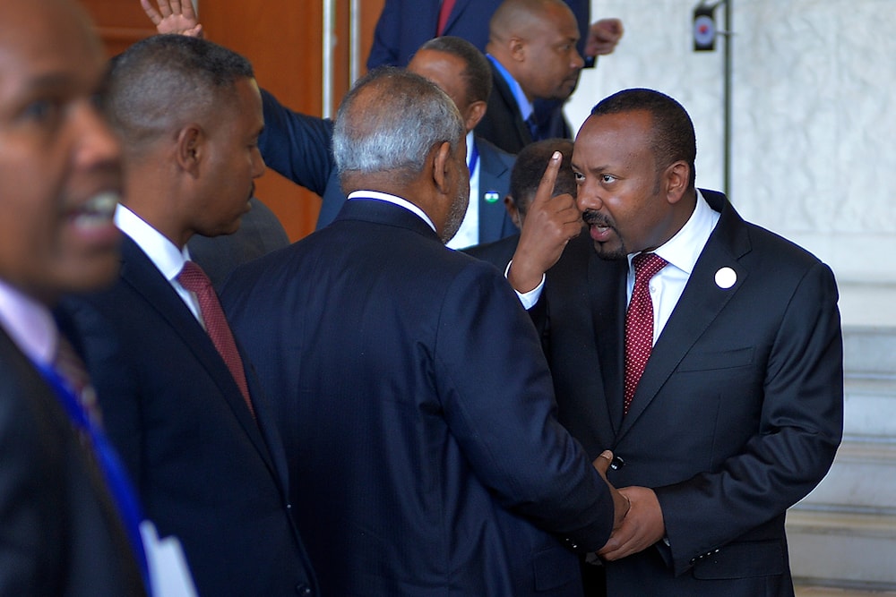 Ethiopian Prime Minister Abiy Ahmed, center, engage with other African leaders at the opening session of the 37th Ordinary session of the Assembly of the African Union (AU) Summit in Addis Ababa, Ethiopia, Saturday, February 17, 2024 (AP)