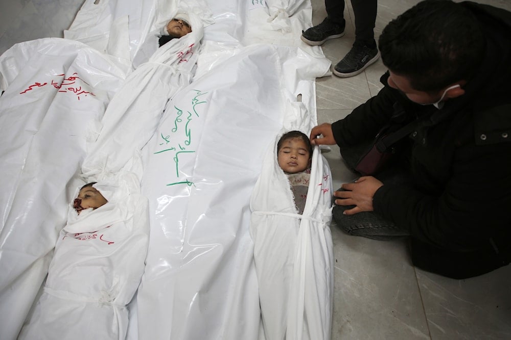 Palestinian children killed in the Israeli bombardment of the Gaza Strip lie in the morgue of a hospital in Rafah, southern Gaza Strip, Friday, March 29, 2024. (AP)