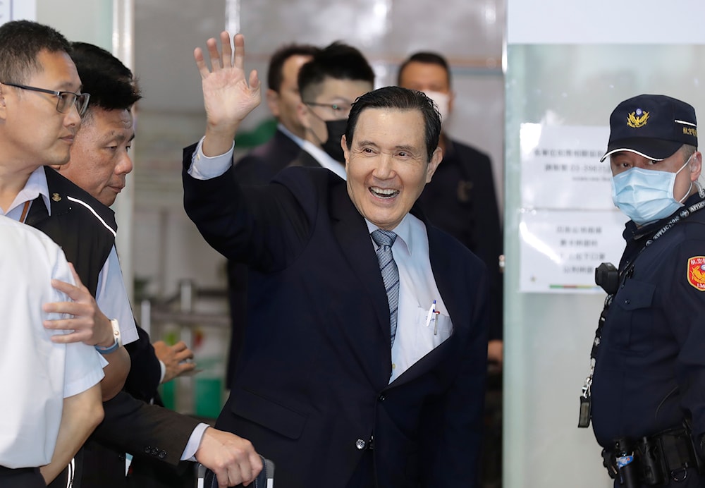 Former Taiwan President Ma Ying-jeou waves as Ma leaves for China, at Taoyuan International Airport in Taoyuan City, northern Taiwan, Monday, April 1, 2024.  (AP)