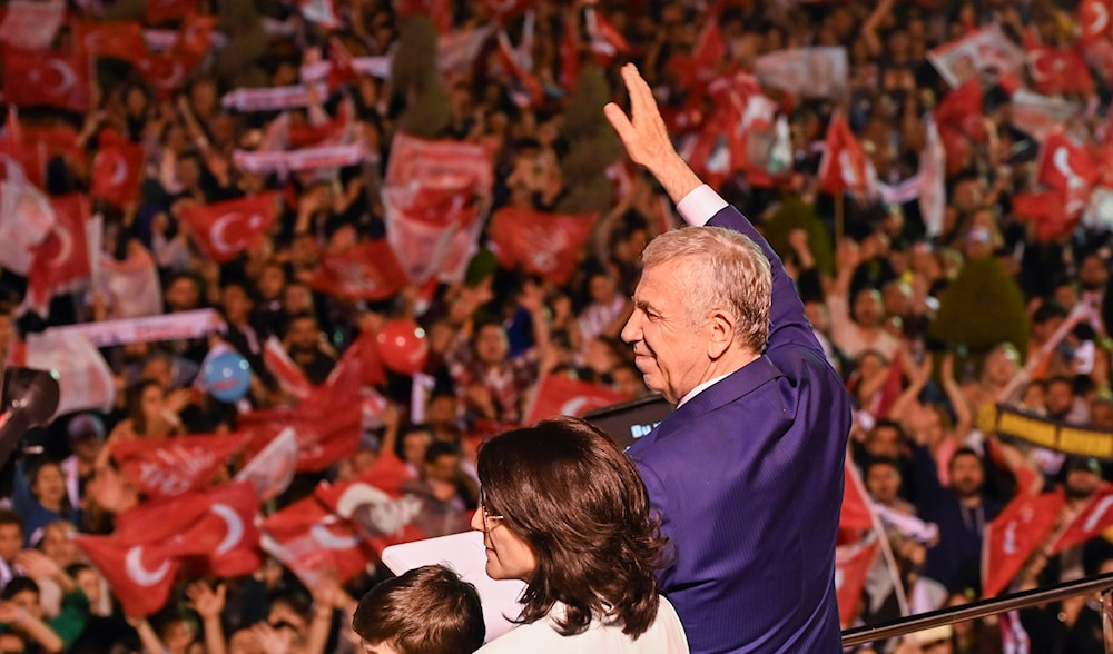 Ankara's Mayor and Republican People's Party, or CHP, candidate Mansur Yavas gestures to supporters, in Ankara, Turkey, Sunday, March 31, 2024. (AP)