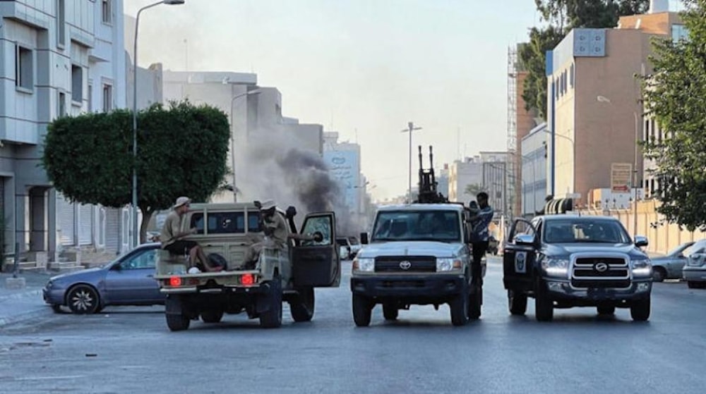 Dbeibeh-affiliated forces in Tripoli, Libya (AFP)