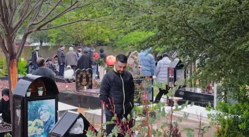 People in Aitaroun visit the shrines of their loved ones on the first day of Eid al-Fitr on April 10, 2024. (Social Media)