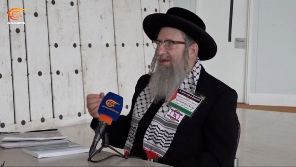 A screengrab for Rabbi Yisroel Dovid Weiss, a prominent figure within the Neturei Karta Orthodox Jewish movement in America, during an exclusive interview for Al Mayadeen. (Al Mayadeen)