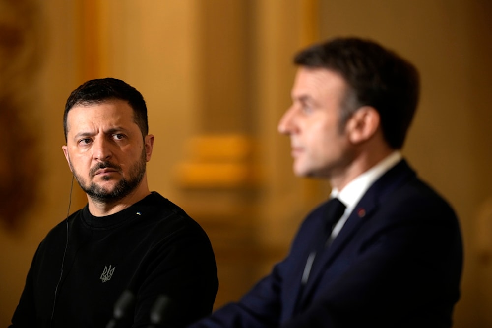 French President Emmanuel Macron, right, and his Ukrainian counterpart Volodymyr Zelenskyy attend a joint press conference after signing an agreement, Friday, Feb. 16, 2024 at the Elysee Palace in Paris. 