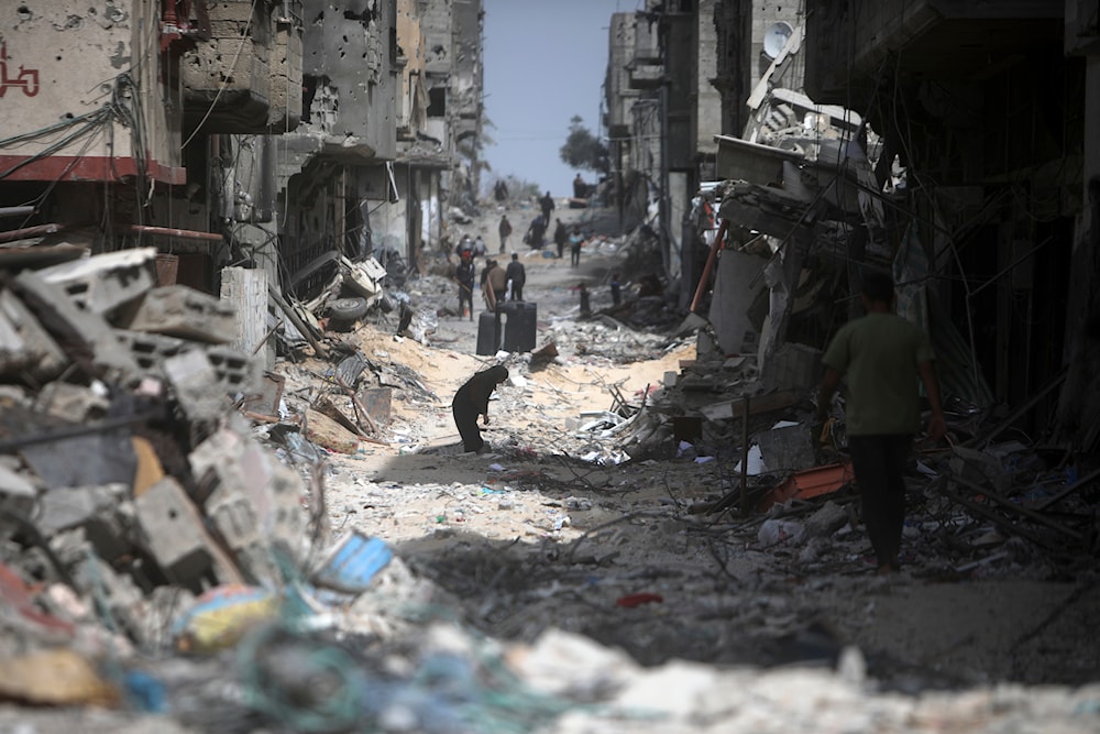 Palestinians visit their destroyed homes after Israeli forces left Khan Younis, Gaza Strip, Wednesday, March 6, 2024. (AP)