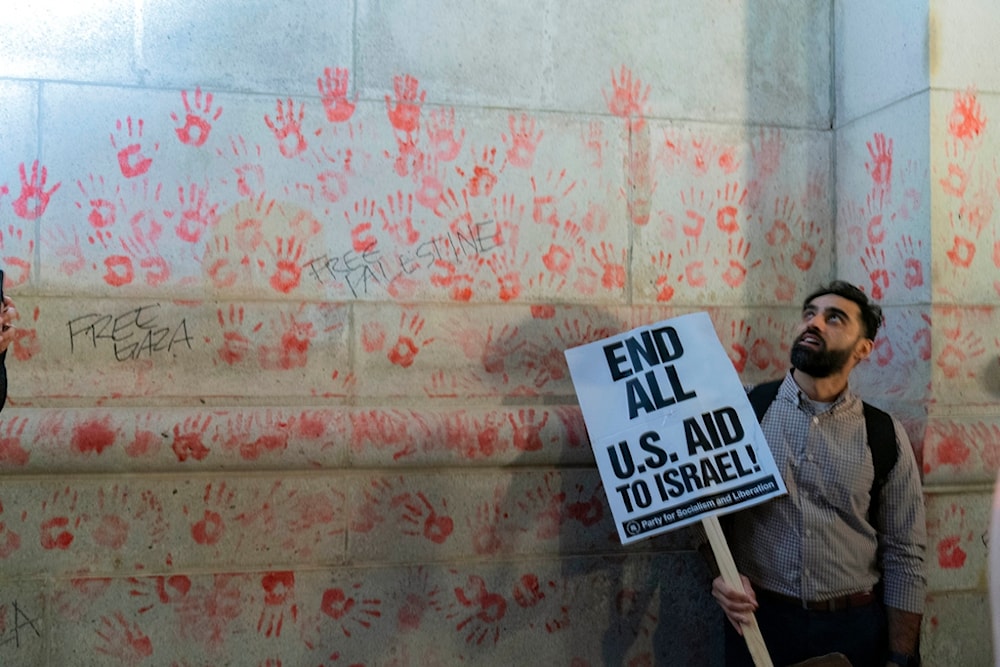 Hand prints are seen on the wall of Union Station building as demonstrators protest during a pro-Palestinian rally asking for a cease fire in Gaza, in Washington, Friday, Nov. 17, 2023. (AP)