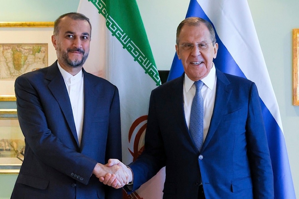 Iran's Foreign Minister Hossein Amir-Abdollahian and Russia's Foreign Minister Sergey Lavrov on the sideline of the BRICS in Cape Town, South Africa, June 2, 2023. (Russian MFA Press via AP)